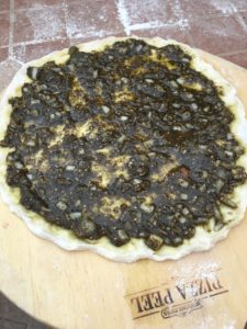 zaatar on pizza tray