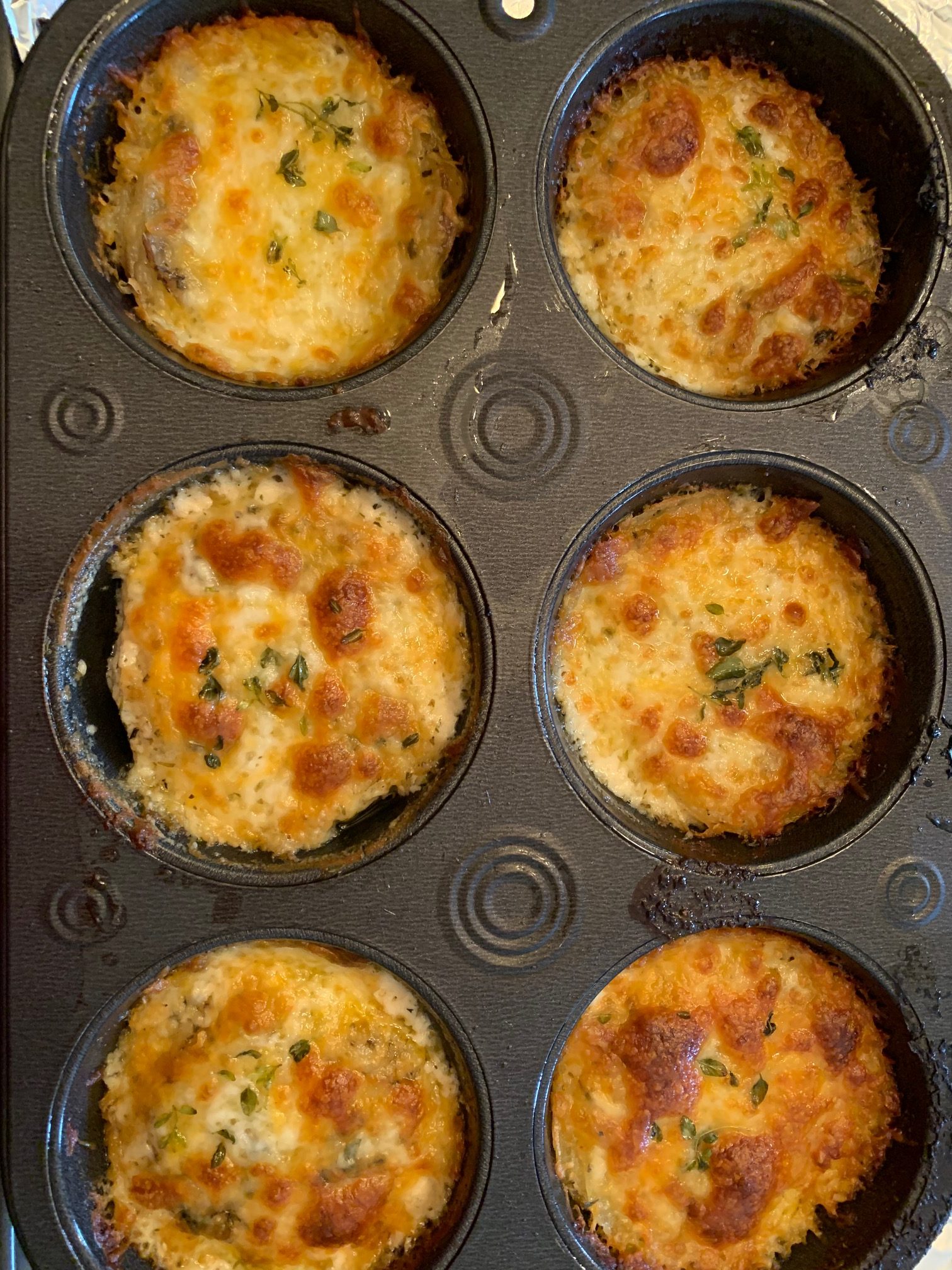cheesy potatoes in muffin tins